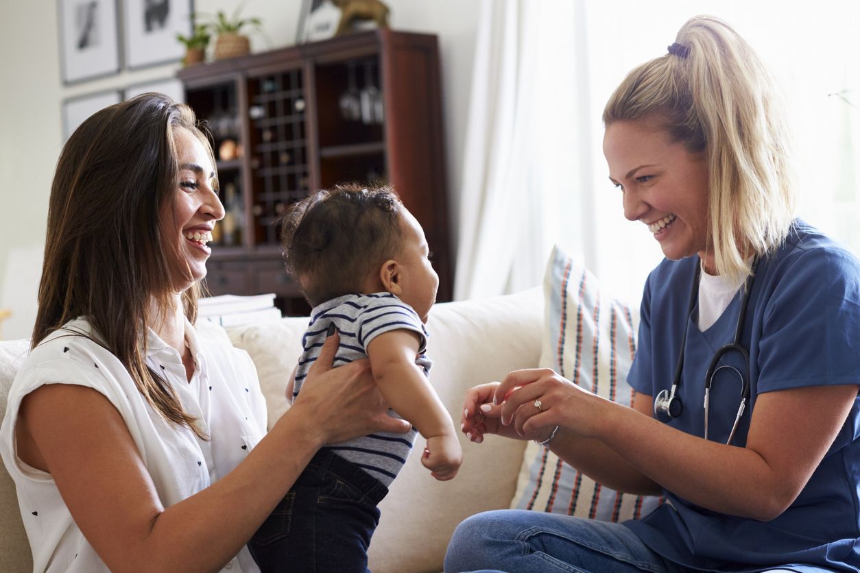 Child receiving pediatric home care services at home