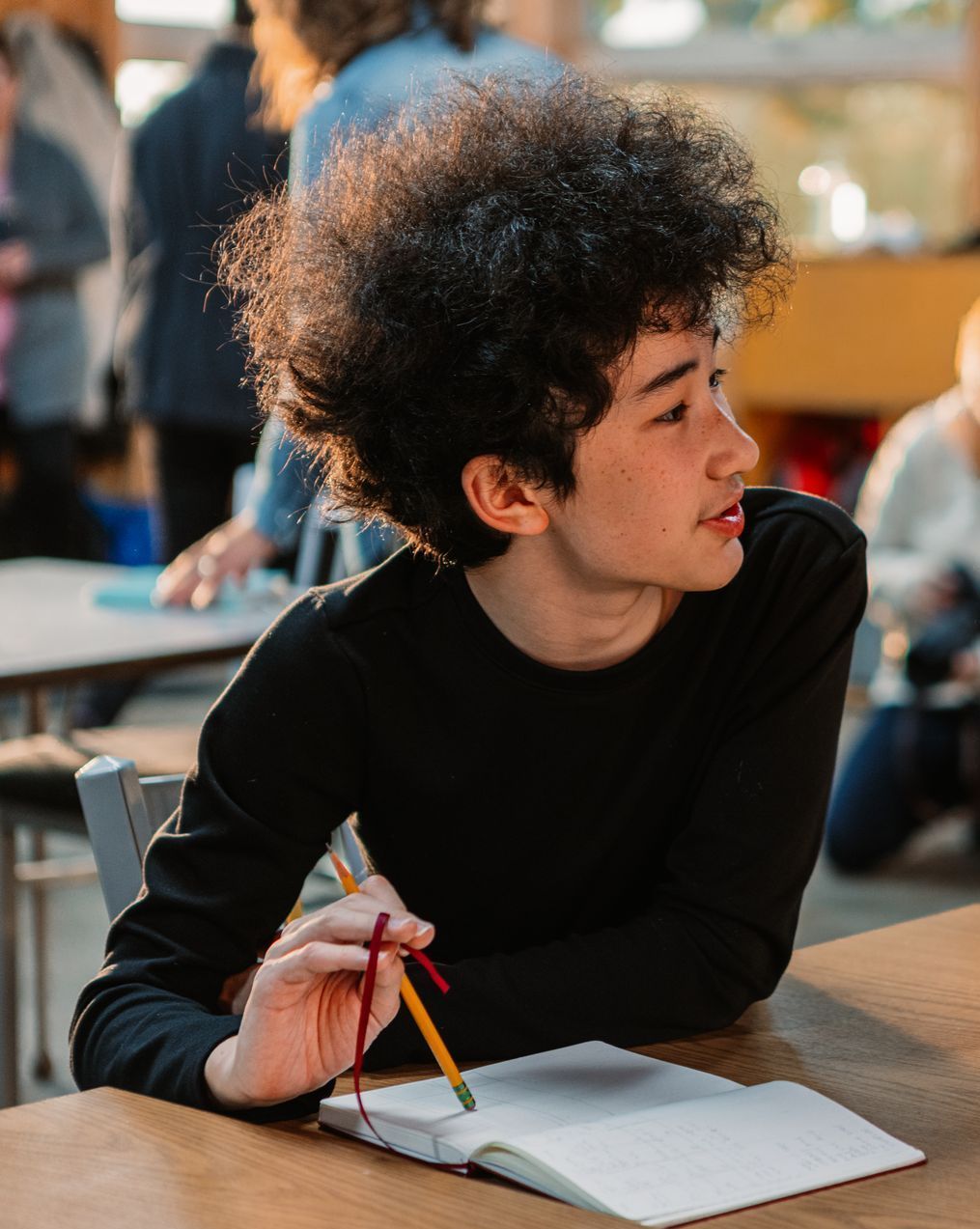 Montessori middle school student in the classroom