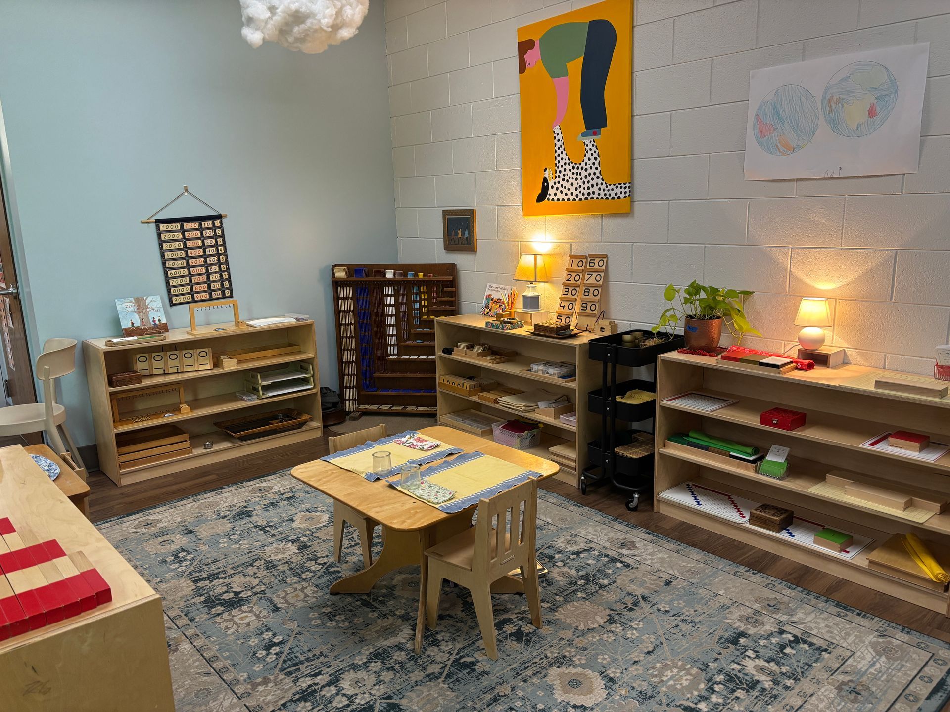 A cozy math corner in a prepared Montessori primary environment