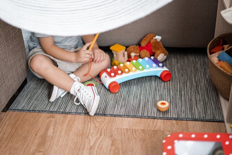 Montessori child playing offering choices