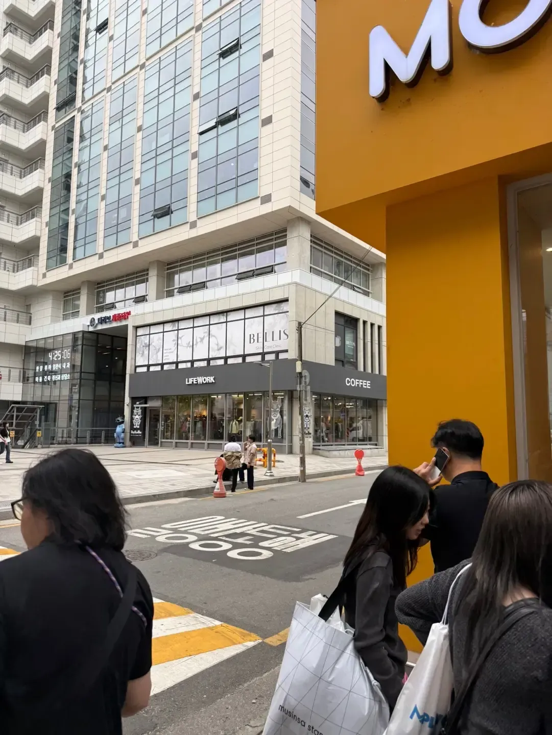 Seongsu Station to Bellis Clinic photo direction 4: Continue toward The Liv Sejong Tower