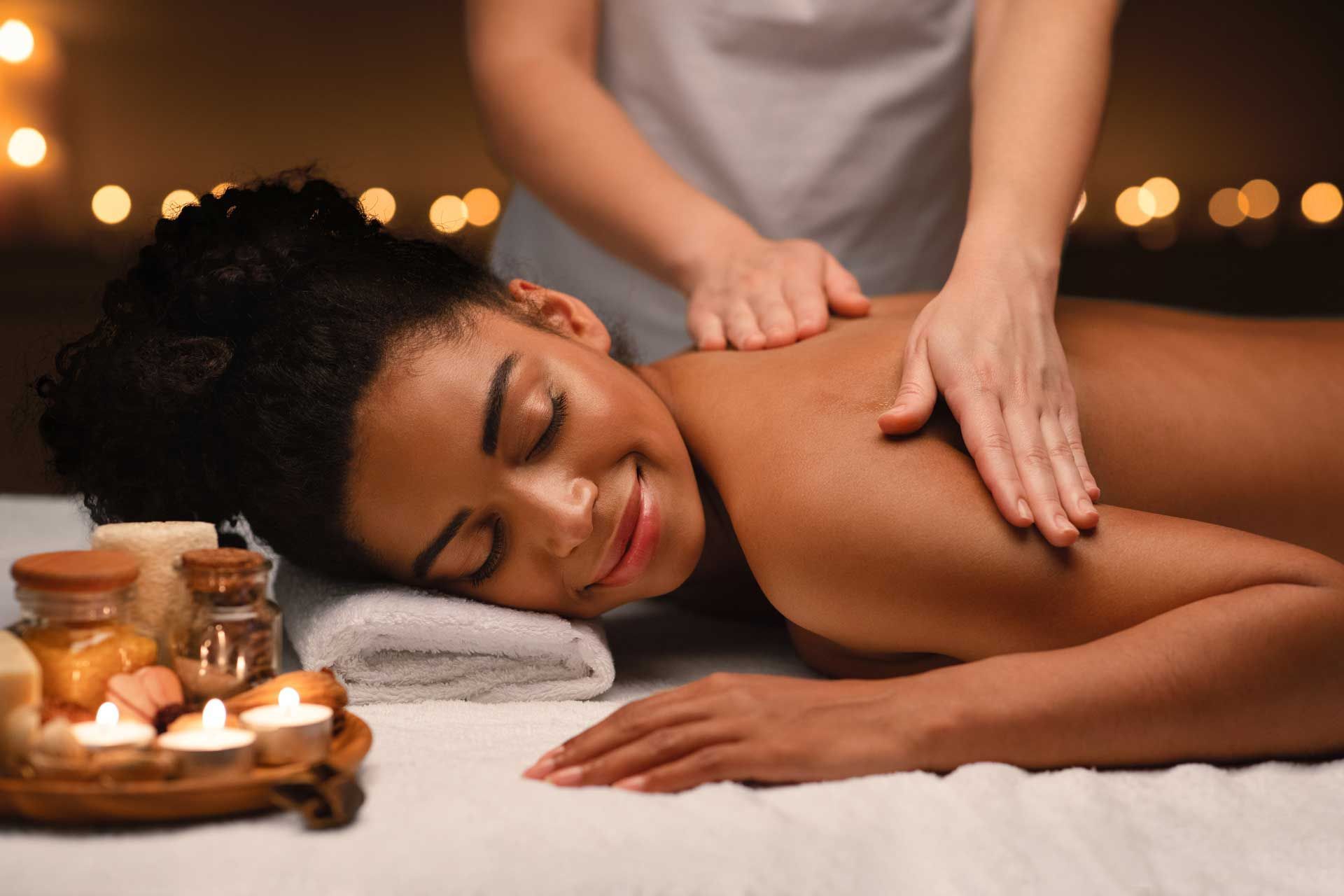 A woman is getting a massage at a spa.