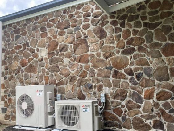 Two Units Sitting In front Of a Brick Wall — Frigid-Air PTY Ltd In Lennox Head, NSW