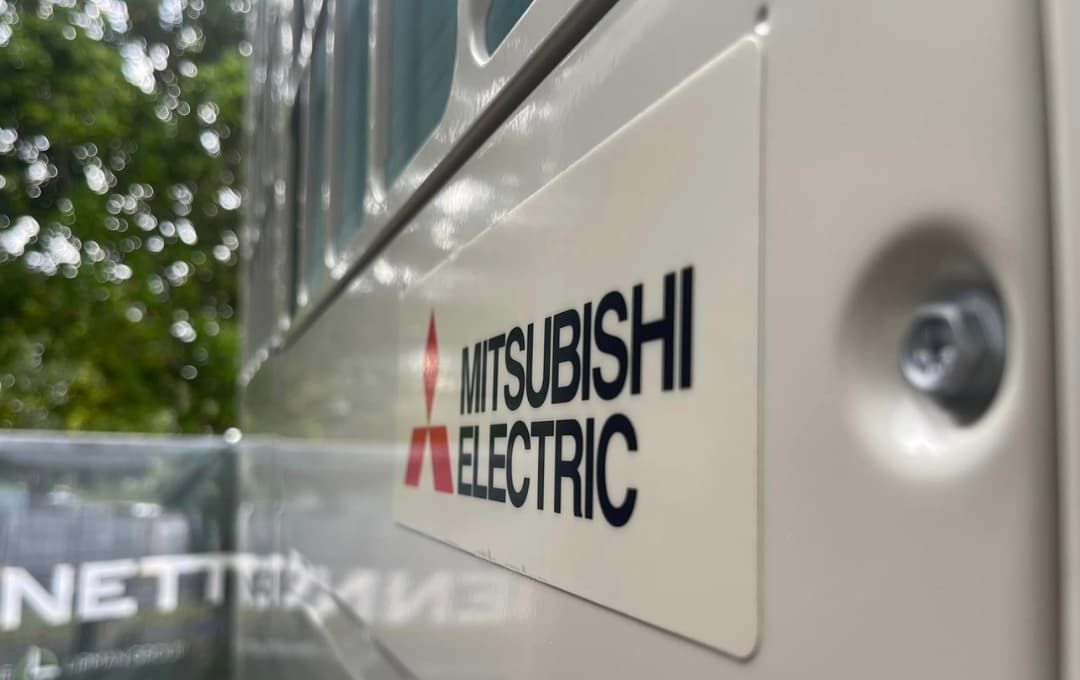 A Mitsubishi Electric Sign is on the Side of a Vehicle — Frigid-Air PTY Ltd. in South Lismore, NSW