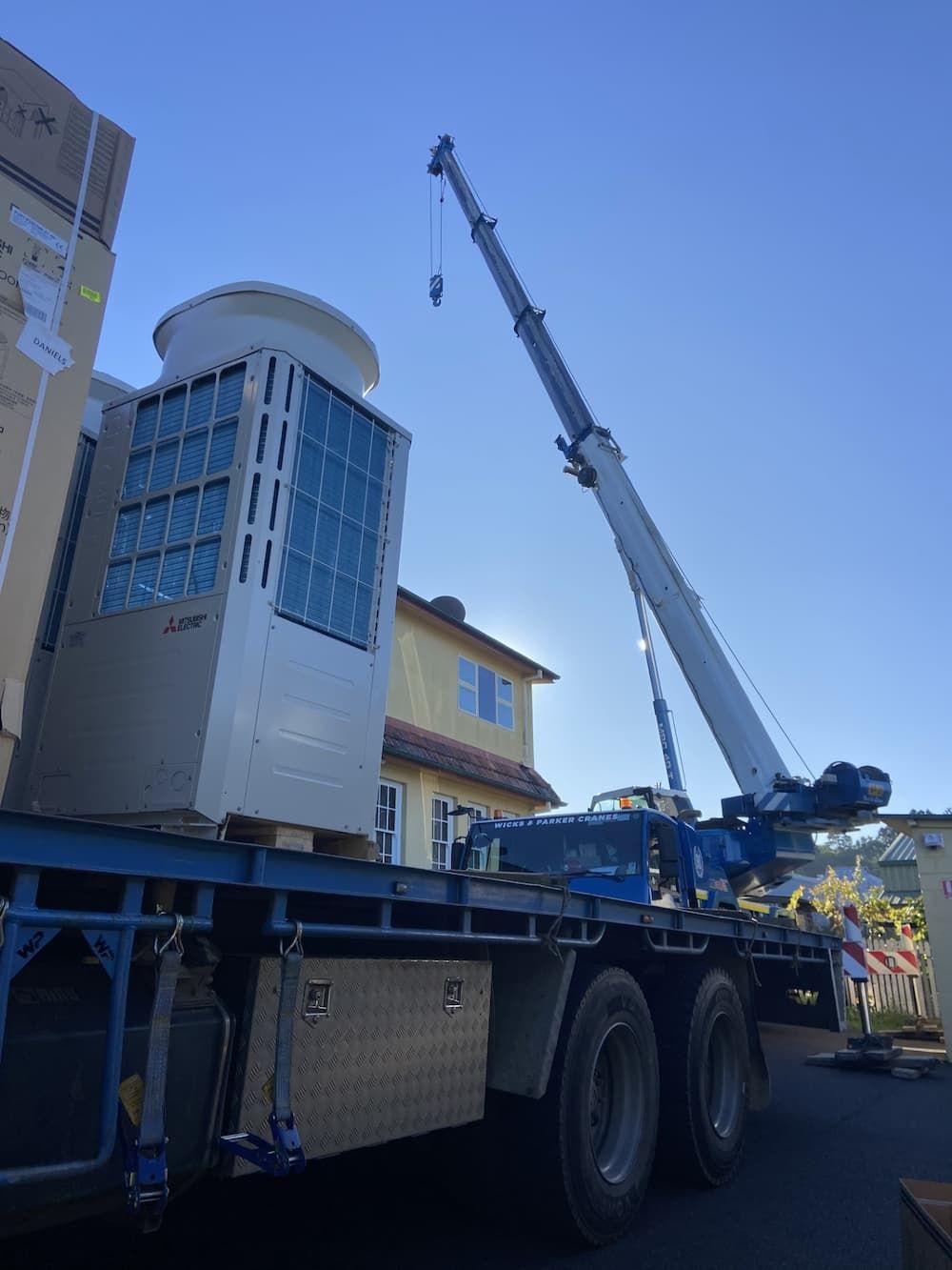 Crane Is Lifting A Large Box On Top Of A Truck
— Frigid-Air PTY Ltd In South Lismore, NSW