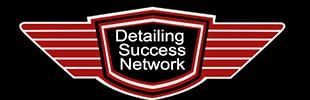 The detailing success network logo is a red shield with wings on a black background.