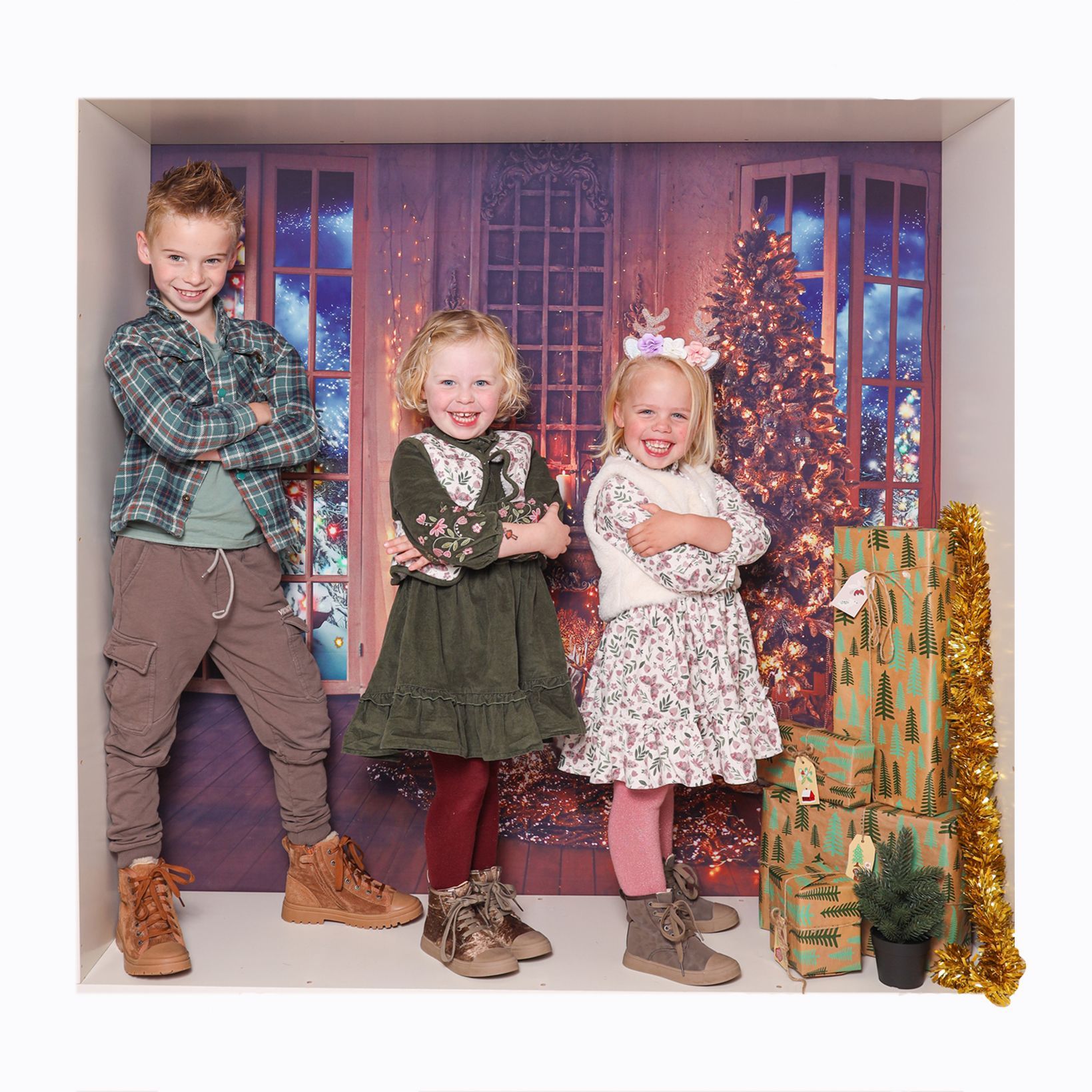 Benieuwd naar een kerstfotoshoot? Lees hoe dit gezin de shoot heeft ervaren en bekijk de gezellige k