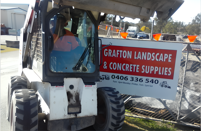 A Tractor with a Sign  — Grafton Concreting & Bobcat Services In South Grafton, NSW