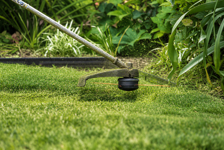 Landscaping crew mowing a lawn