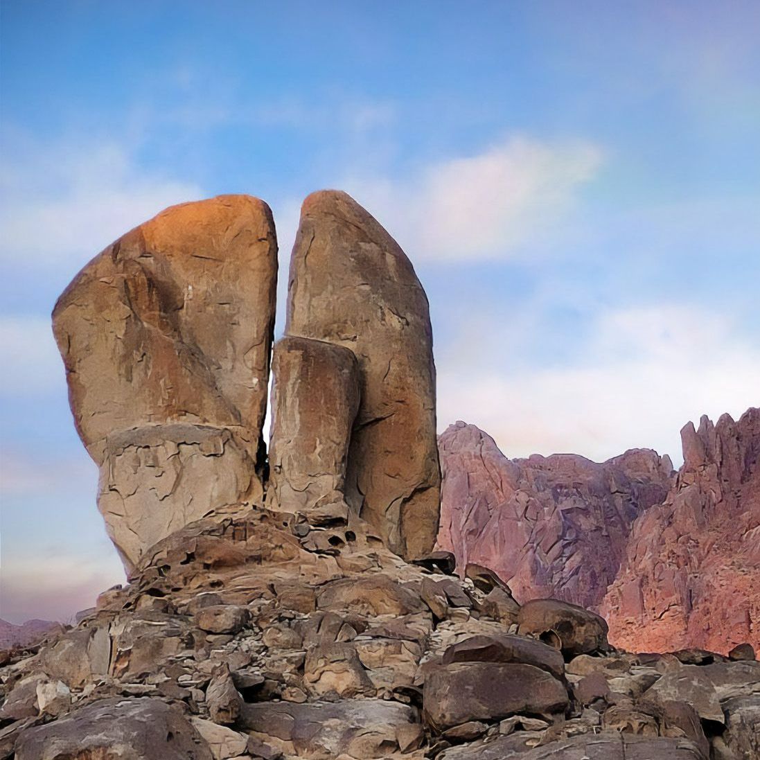 The Split Rock of Moses in the Rephadim desert with mountains in the background