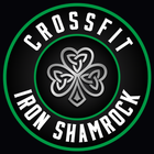Crossfit Iron Shamrock logo with green ring and shamrock emblem on black background
