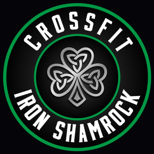 Crossfit Iron Shamrock logo with green ring and shamrock emblem on black background