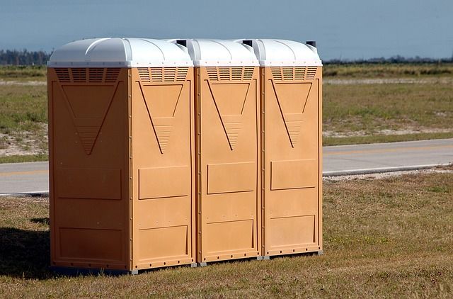 How are porta potties maintained during multi-day events?