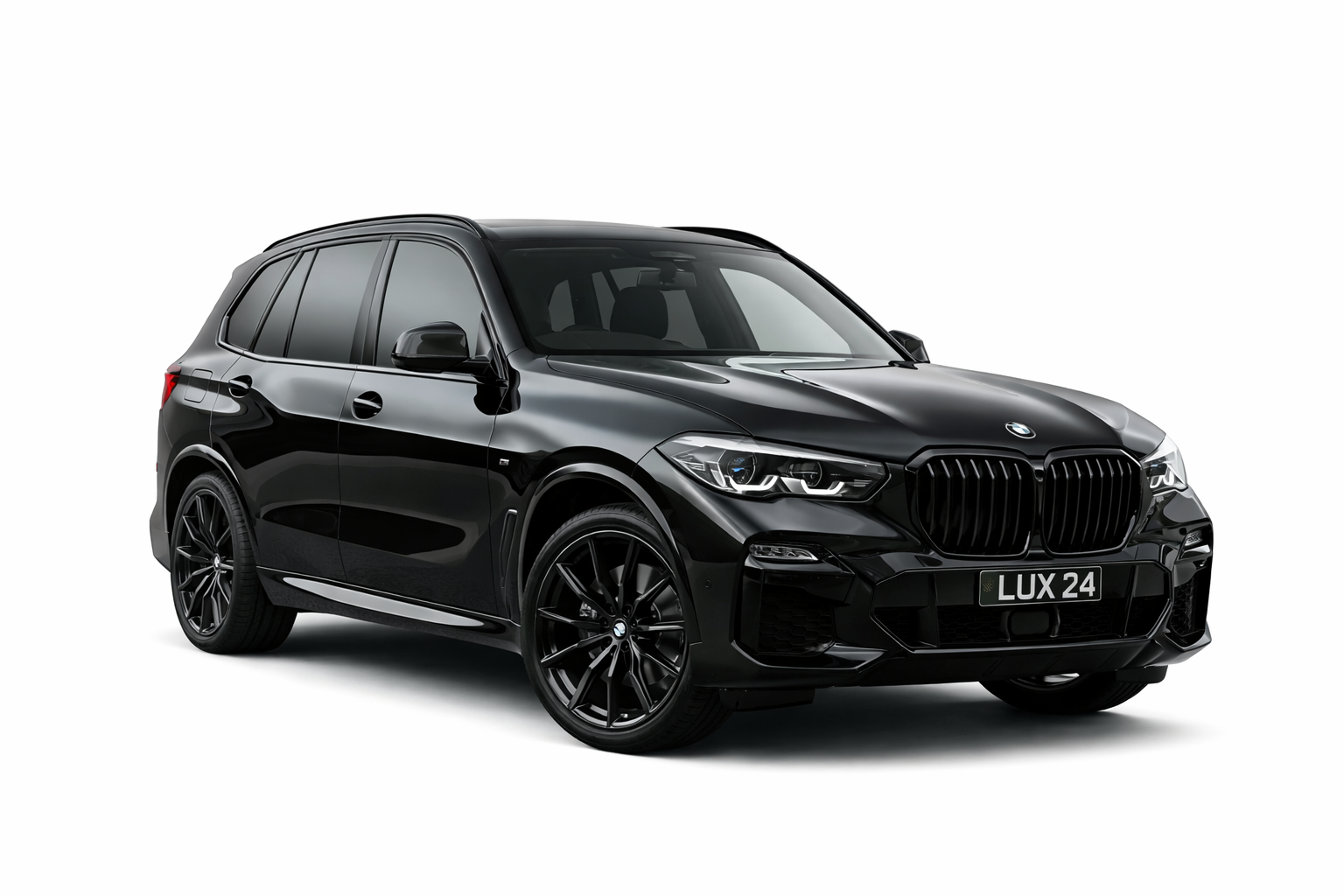 Black BMW X5 SUV parked on a road.