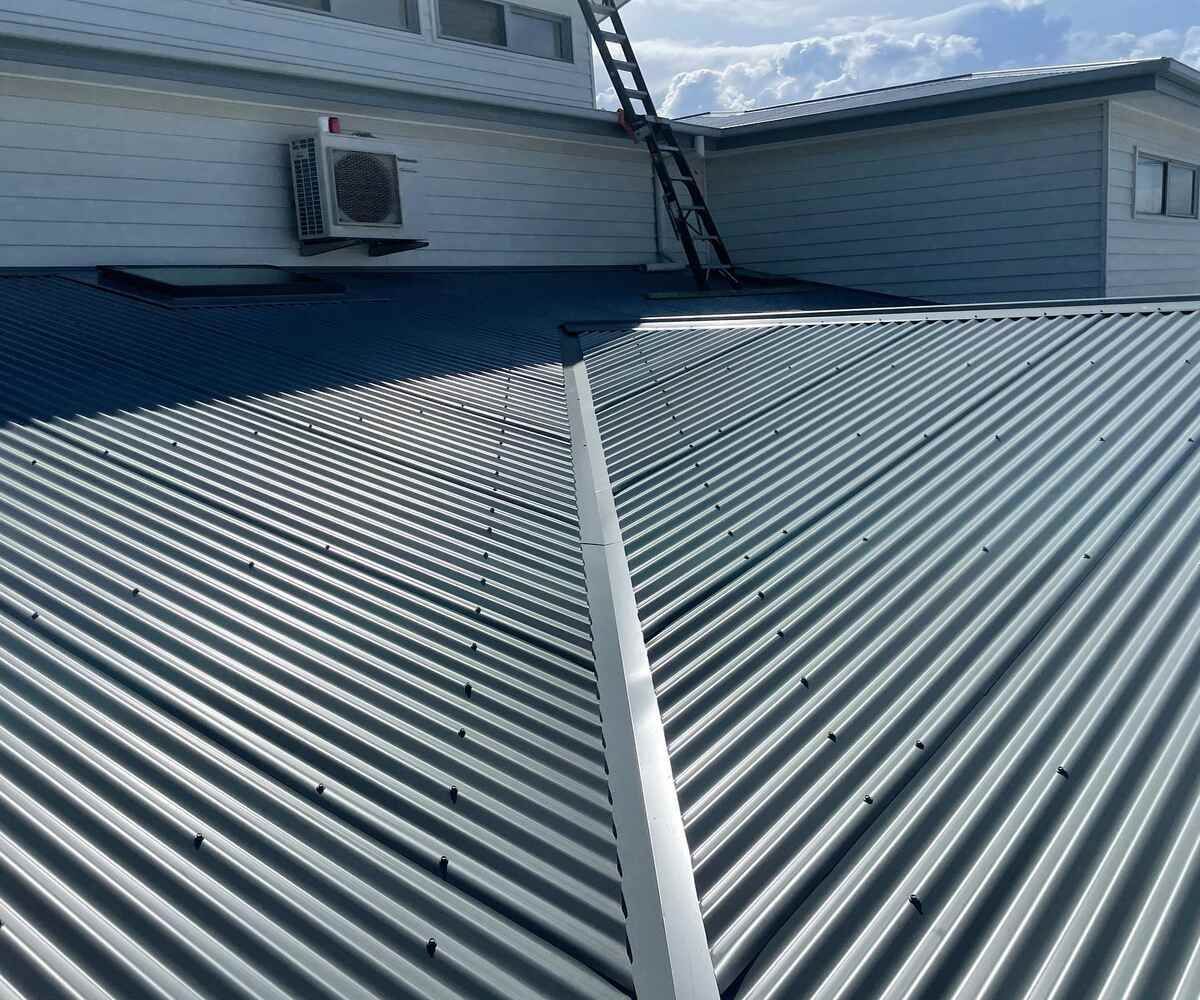 A Close Up Of A Roof With A Fan On It — Elevated Roofing Systems Pty Ltd In Barrack Heights, NSW