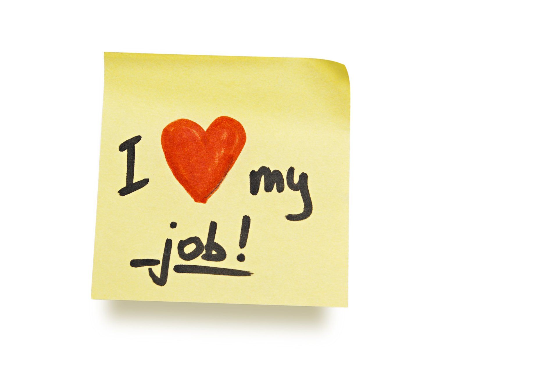 A yellow sticky note that says i love my job