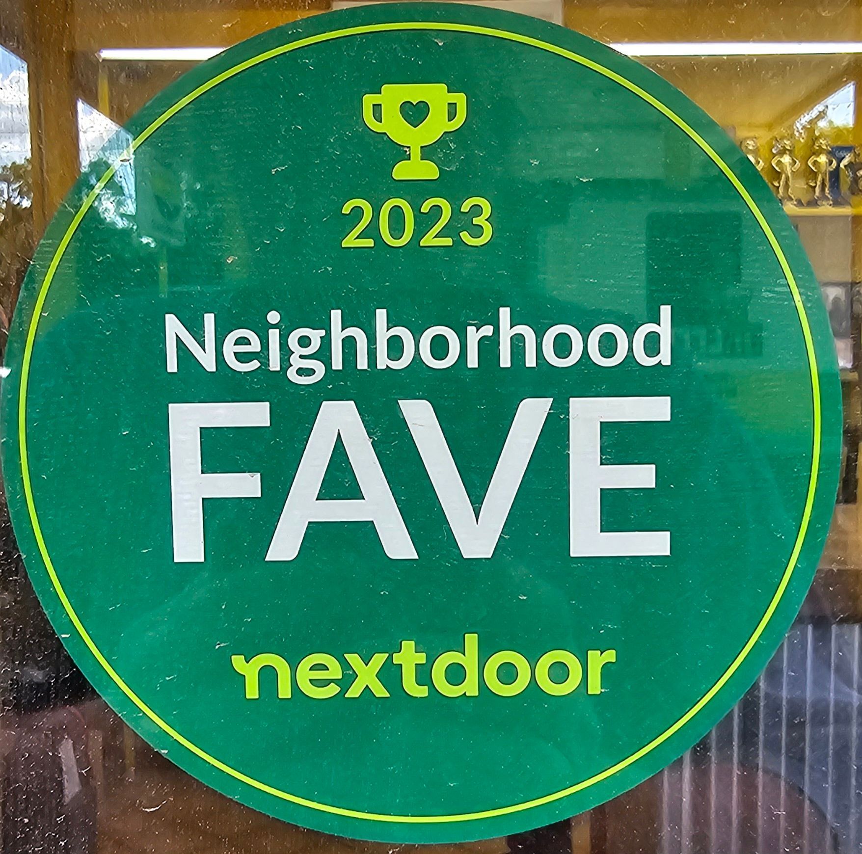 Green circle sticker with 