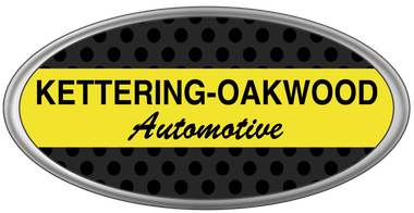 Logo for Kettering-Oakwood Automotive: oval with yellow banner and black text over a perforated black background.