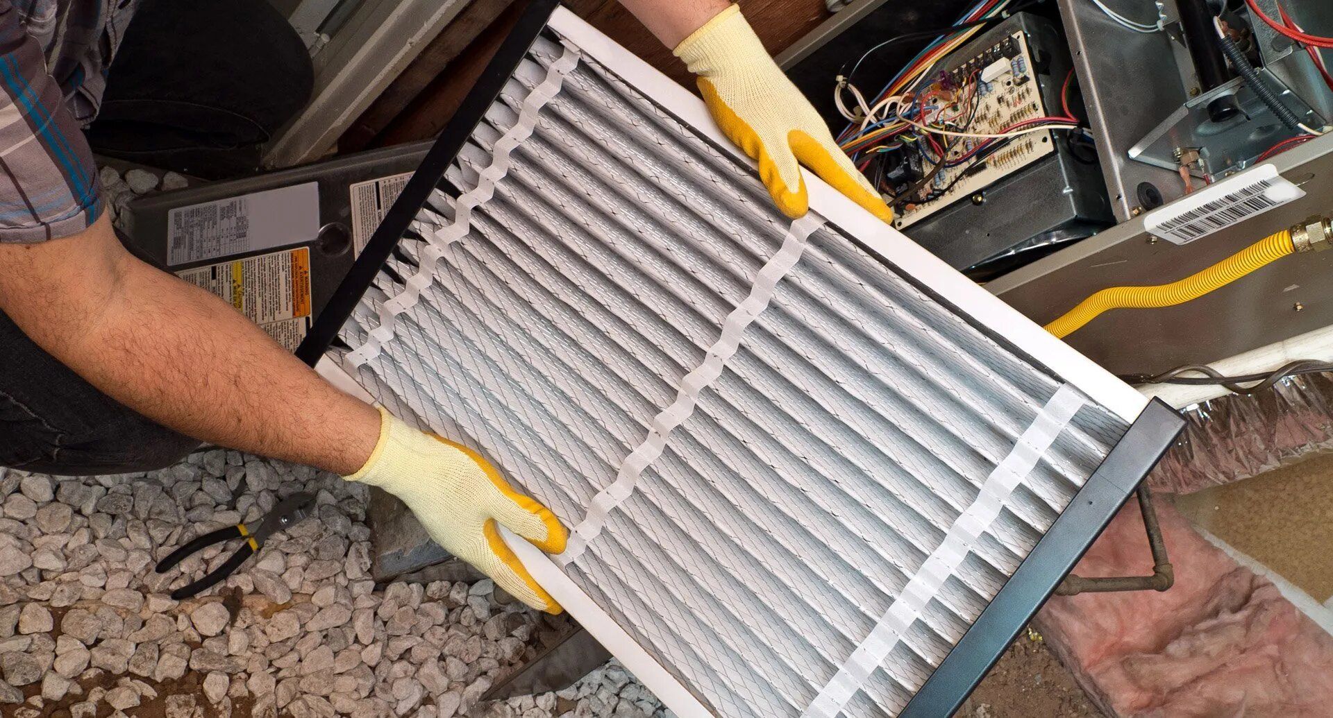 Cleaning HVAC Filter — Madison Heights, MI — Family Heating, Cooling, & Electrical