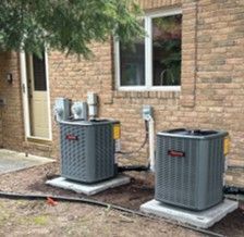 Dual Amana Central Air Conditioning Condensers, Installed. Dual Amana Central Air Conditioning Condensers, Installed.