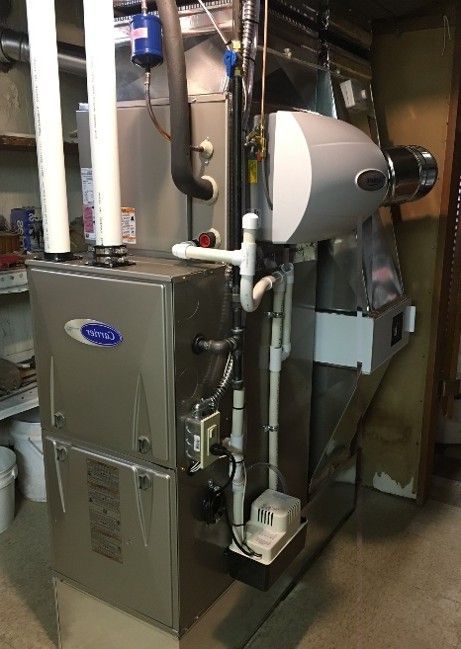 Installation of High Efficiency Carrier Furnace.