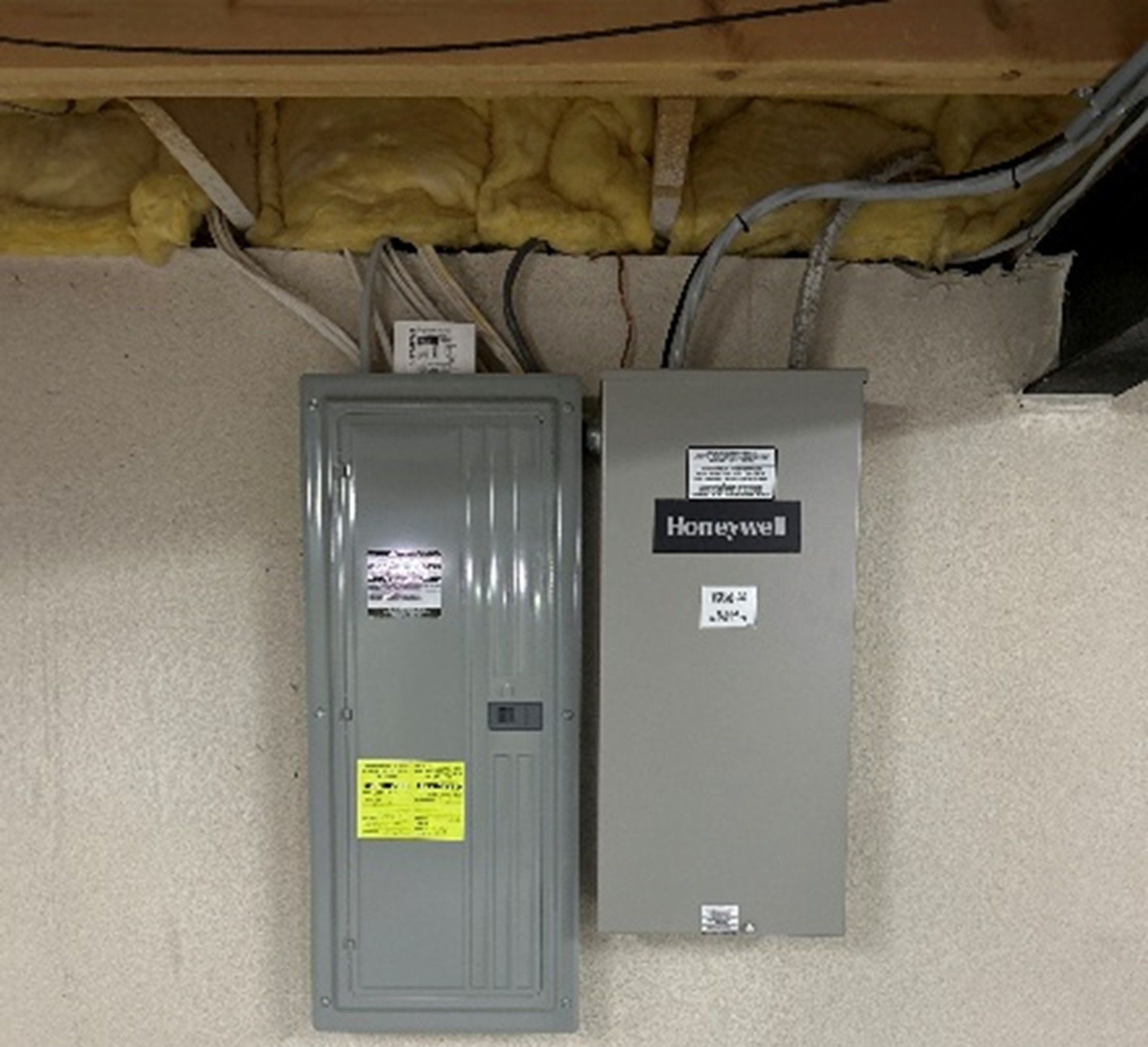 Generator panel installed next to electrical panel
