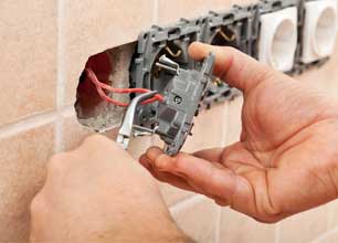 Fixing Electrical Outlet — Madison Heights, MI — Family Heating, Cooling, & Electrical