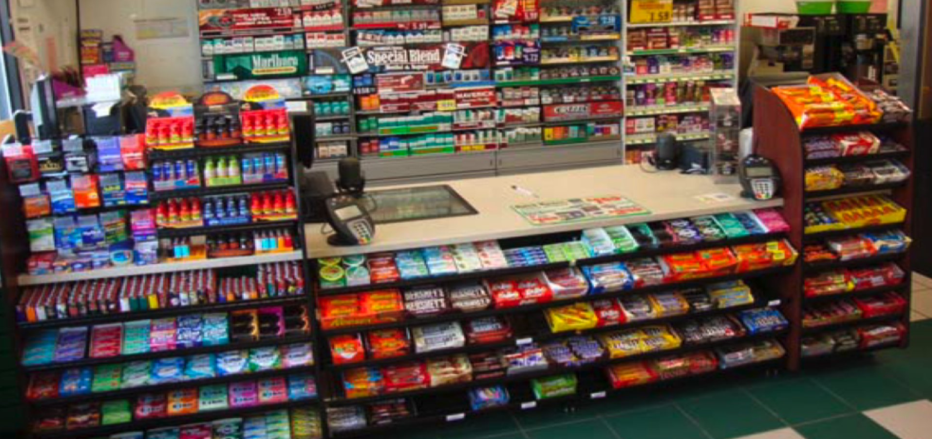 A convenience store filled with lots of candy and snacks
