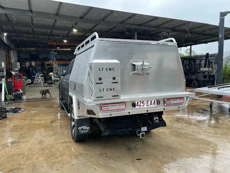 Silver Utility Truck With Canopy Parked in a Workshop — Rod's Engineering & Lifetime Trailers in Bli Bli, QLD