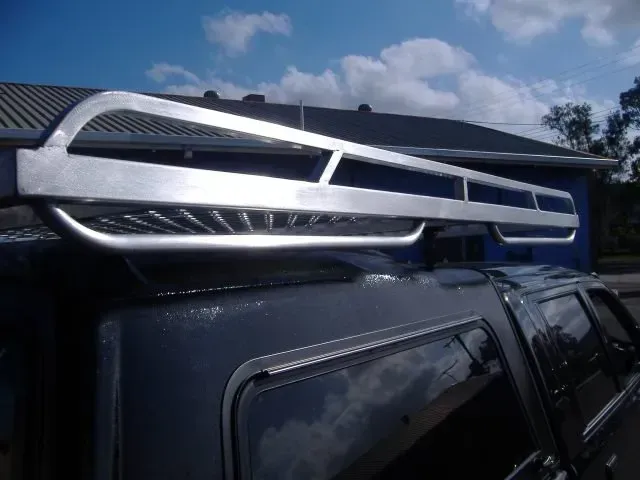 Silver Roof Rack on a Dark Blue Vehicle — Rod's Engineering & Lifetime Trailers in Bli Bli, QLD