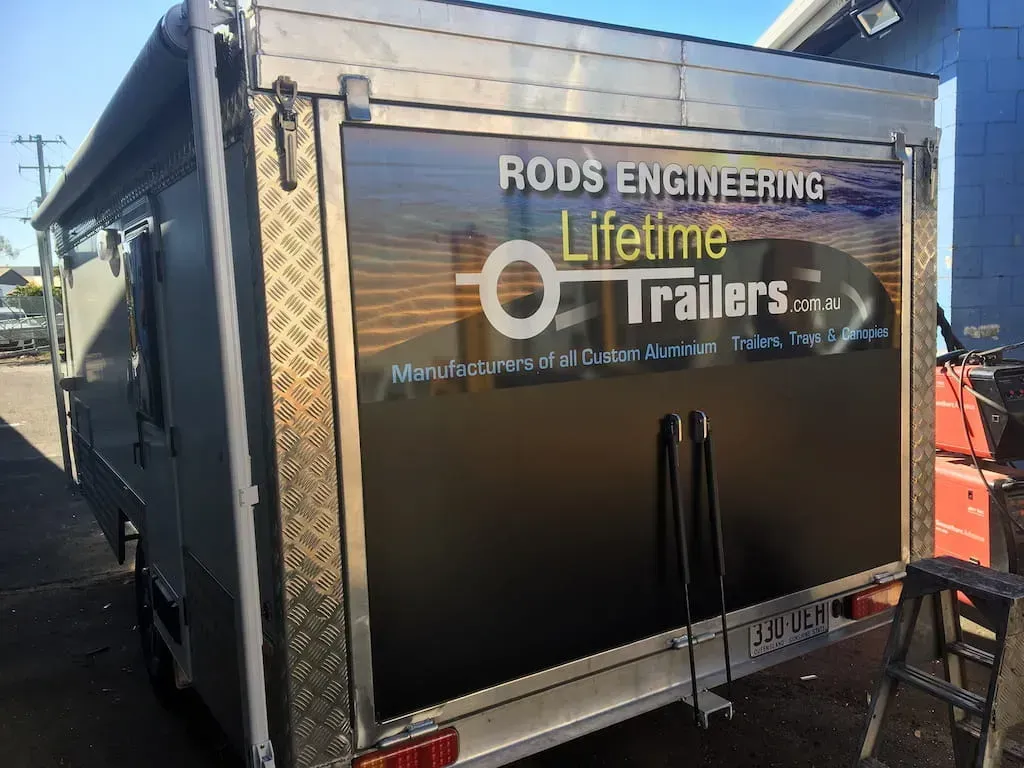 A Silver Enclosed Trailer With a Black Rear Door — Rod's Engineering & Lifetime Trailers in Bli Bli, QLD
