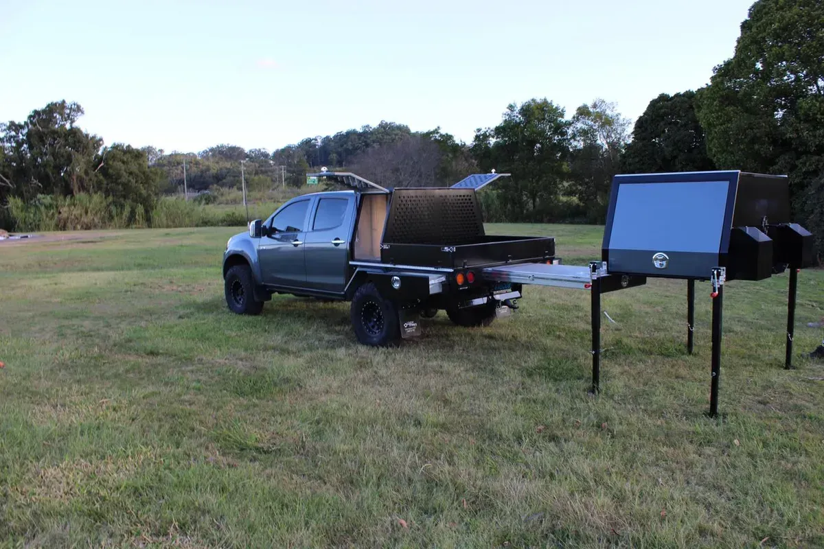 Gray Truck With a Black Tray and Camping Equipment — Rod's Engineering & Lifetime Trailers in Bli Bli, QLD