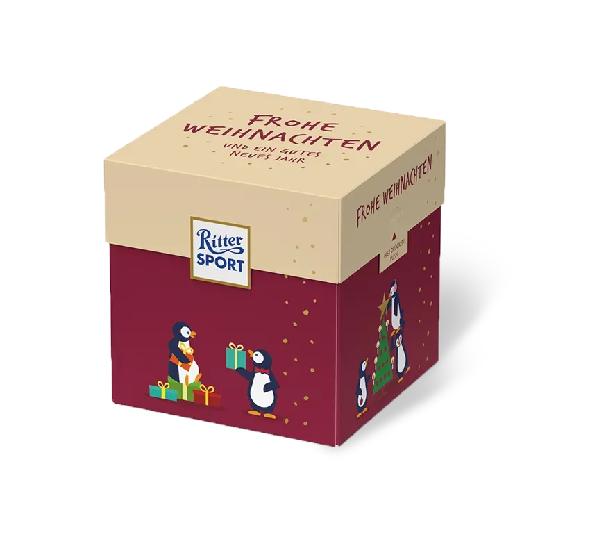 Ritter Sport-Geschenkbox in Bordeauxrot und Beige mit festlichen Winterillustrationen