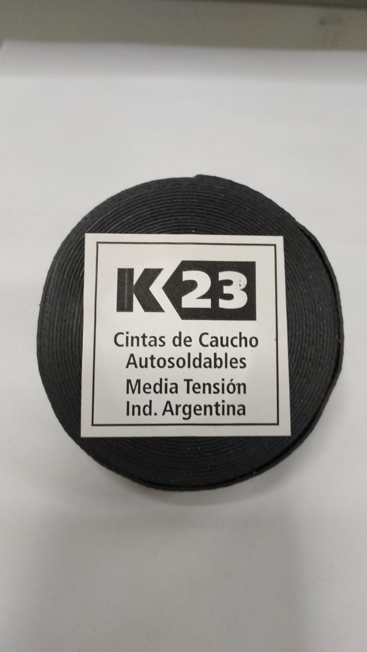 Black electrical tape roll with a label, 