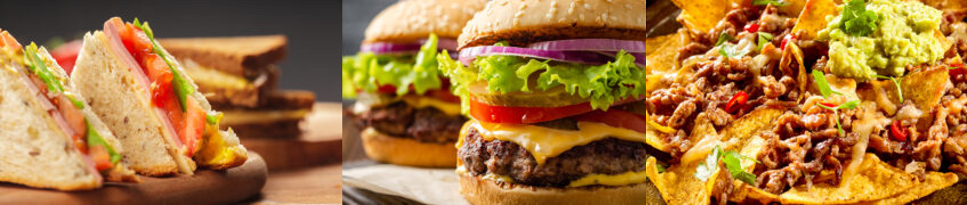 Un sandwich, un hamburger et un taco sur une table en bois.