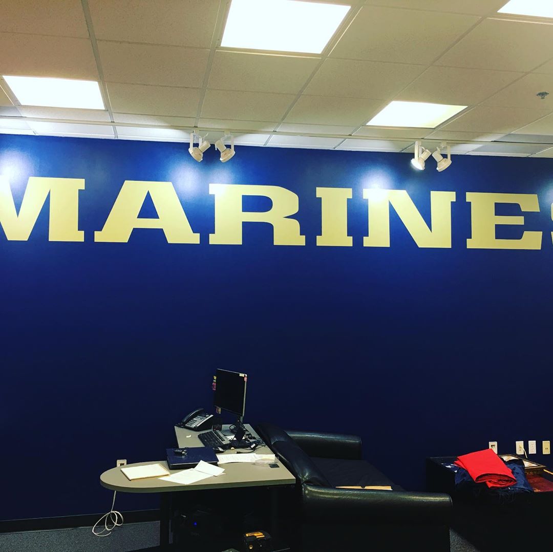 A blue wall with the word marine on it
