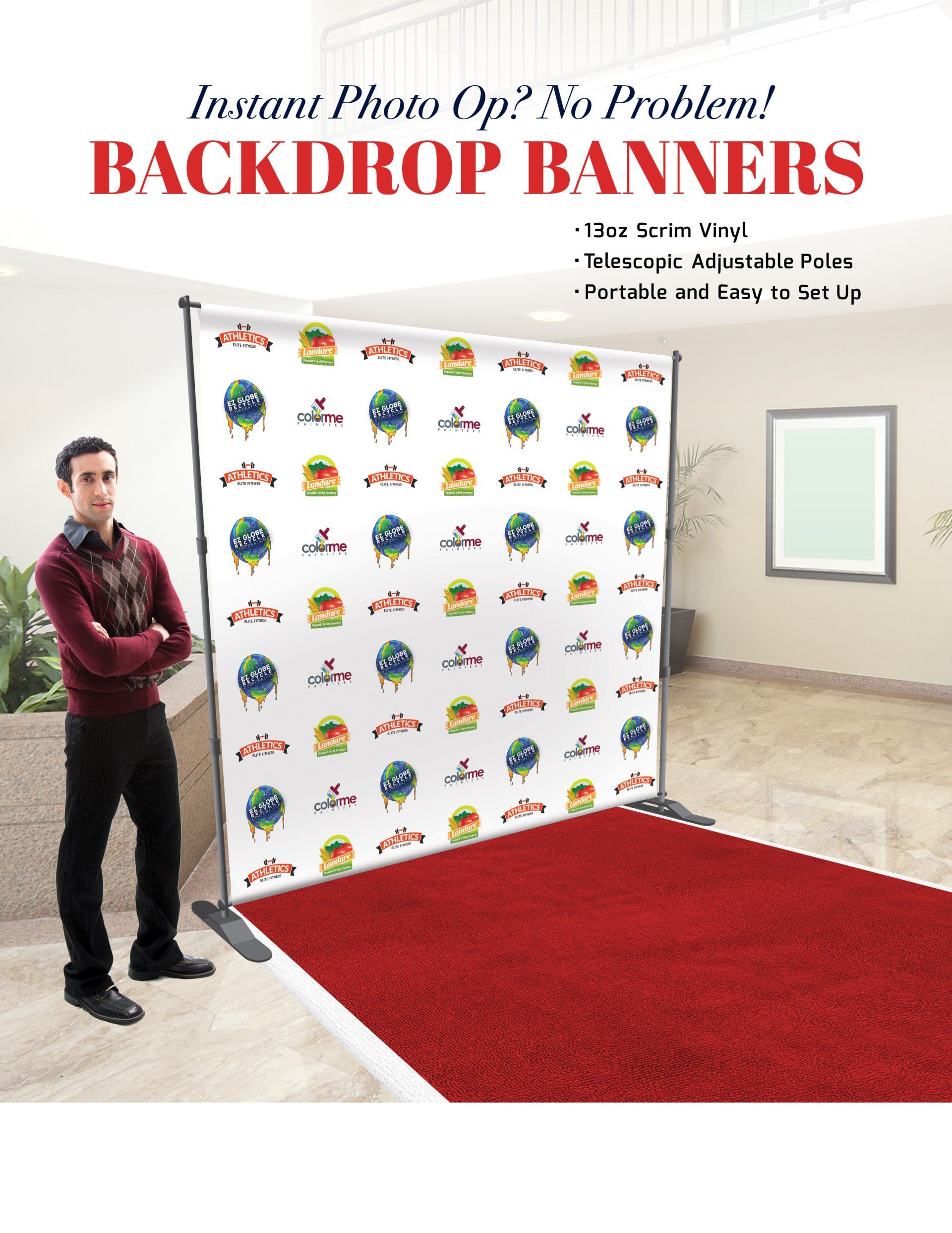A man is standing in front of a backdrop banner.