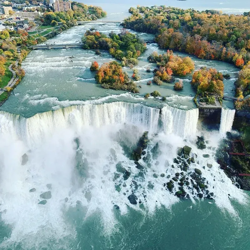 An aerial view of niagara falls in autumn