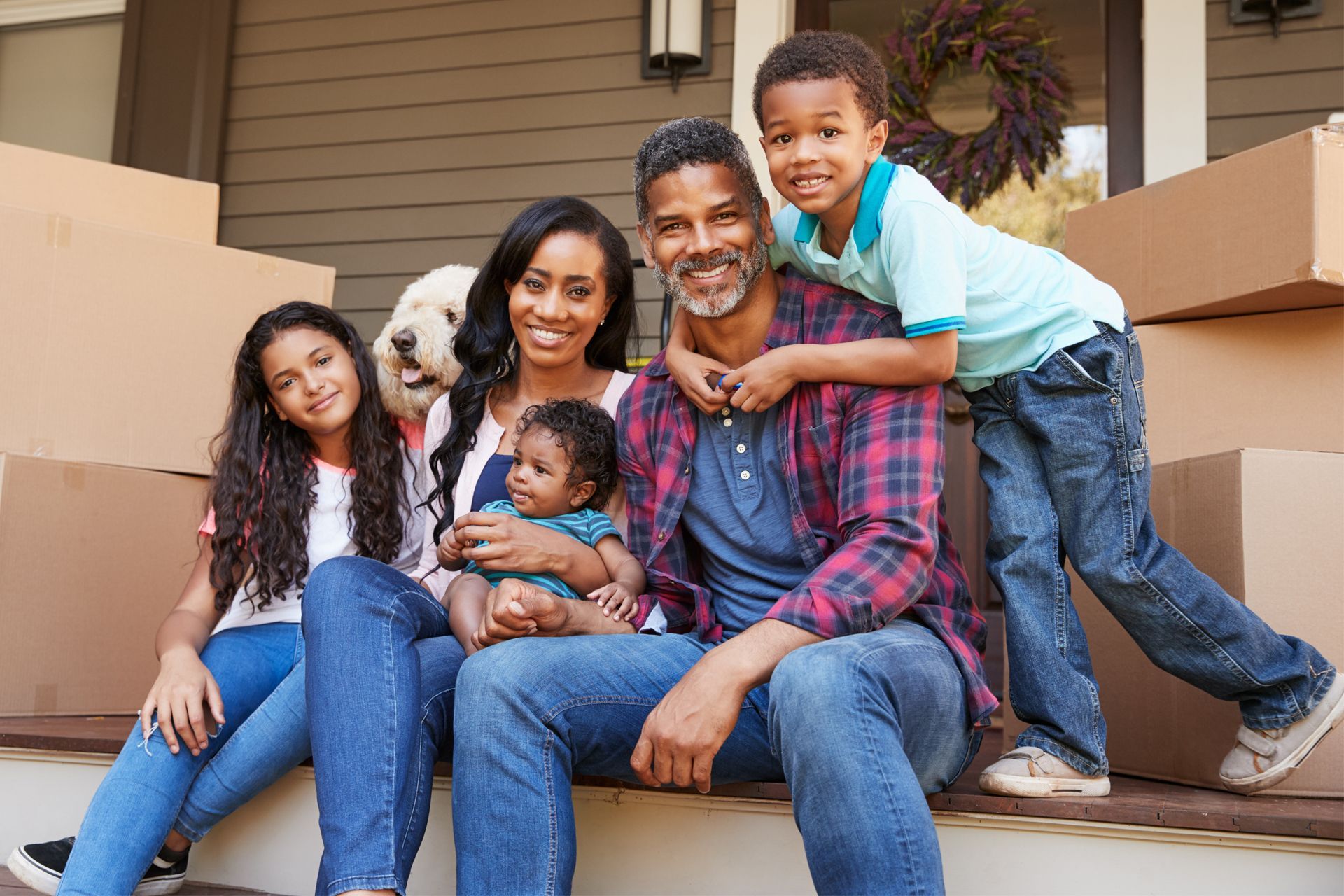 Happy Family Sitting on Porch