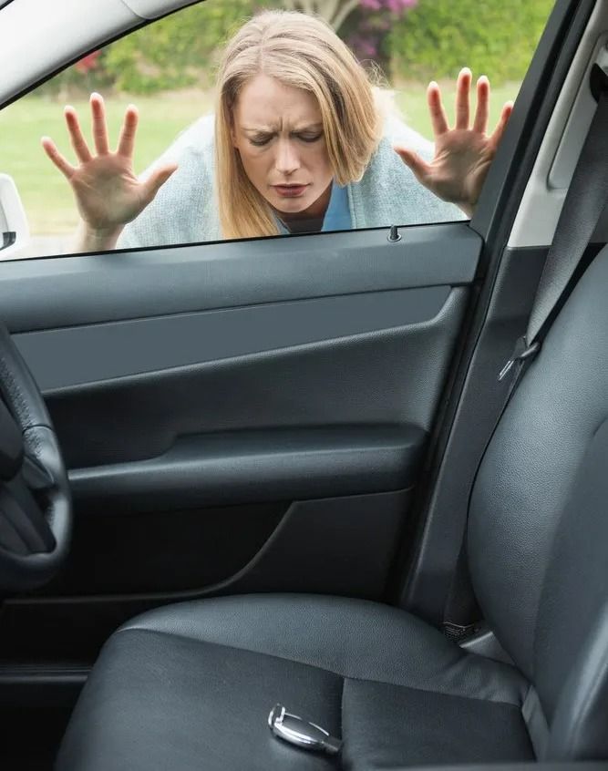 A Woman and a Locked Car — Suresafe Locksmiths in Glenvale, QLD