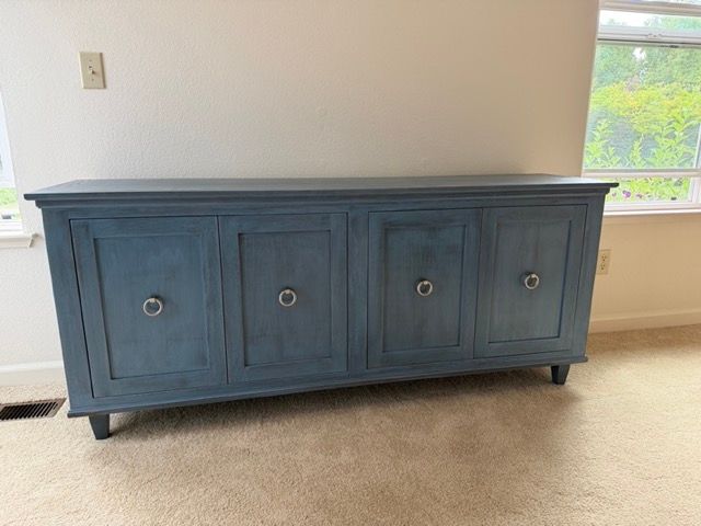 blue finished media cabinet