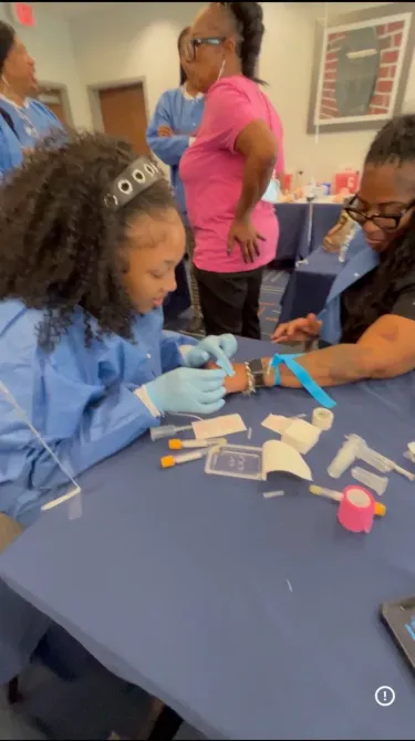 Phlebotomy training workspace with instructor-led hands-on practice