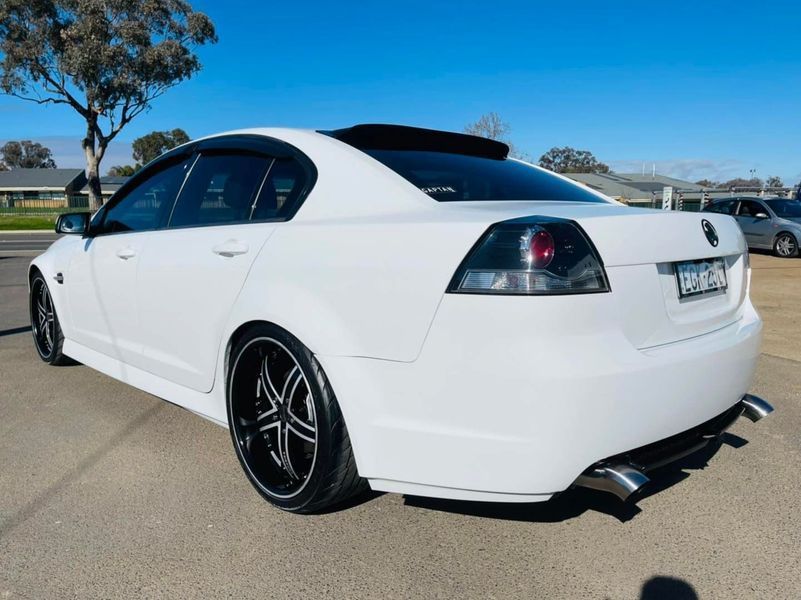 White Sports Sedan With Black Rims Parked Outdoors on a Sunny Day — Jake's Car Detailing in Taminda, NSW