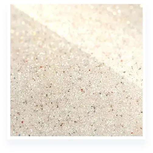Close-up of pale beige textured surface with tiny speckled grains