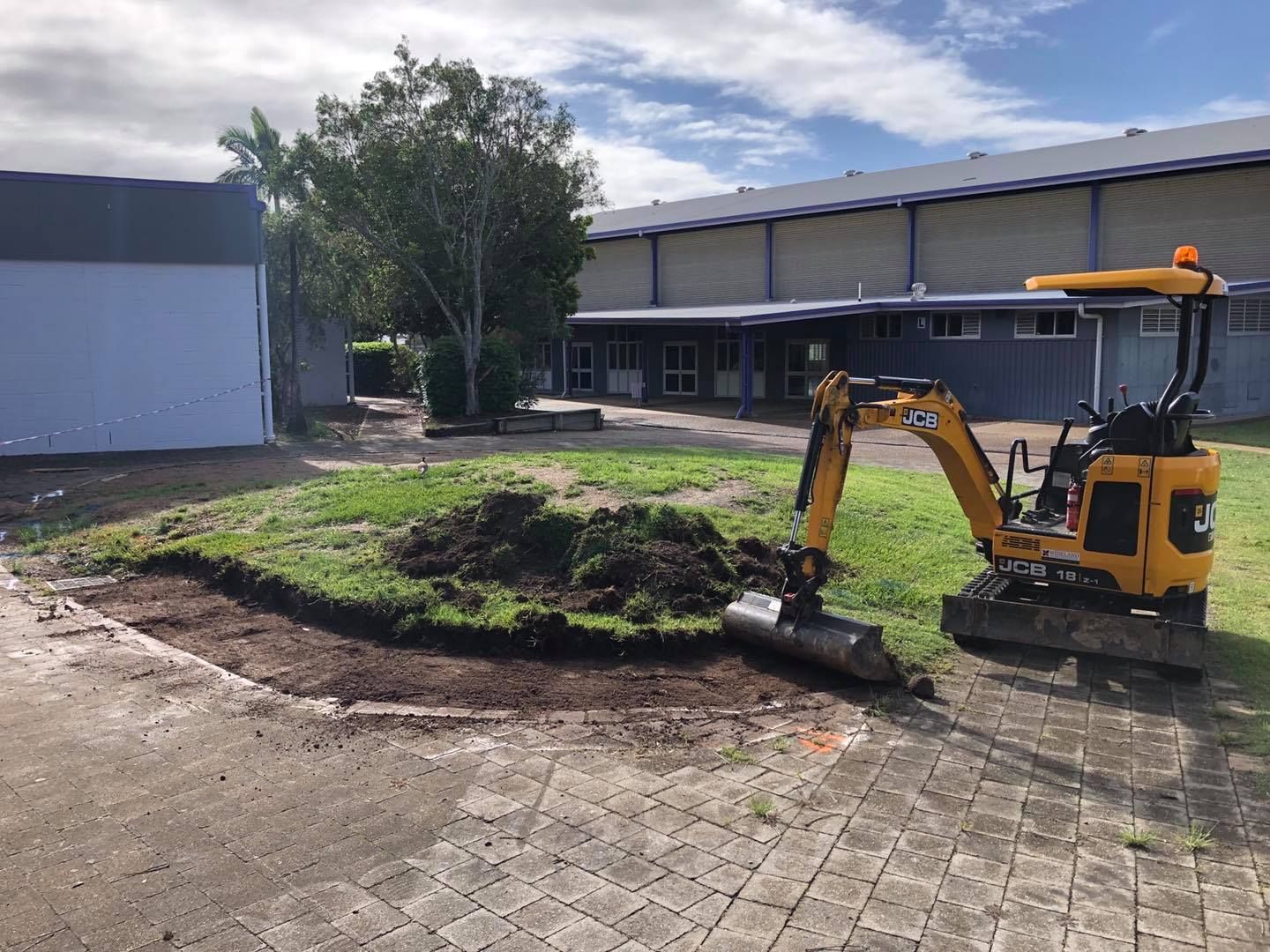 bobcat doing landscaping— Lange's Fencing & Landscaping Centre in Island Plantation, QLD