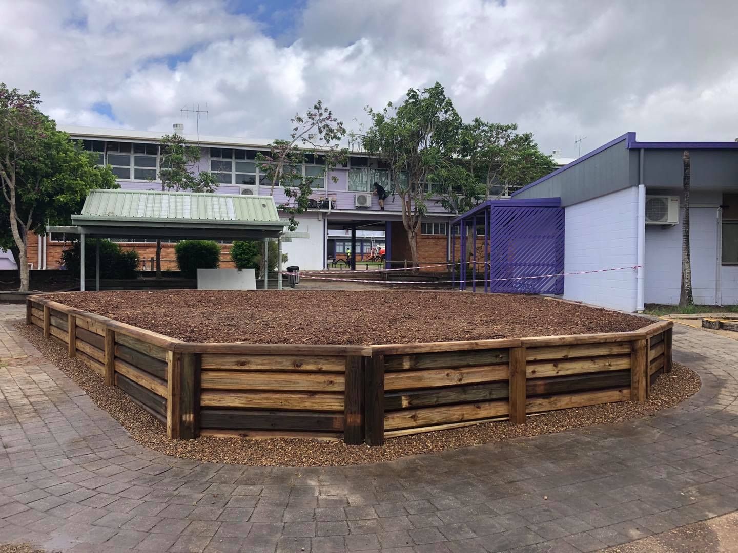Wooden Raised Garden Bed Filled With Mulch — Lange's Fencing & Landscaping Centre in Island Plantation, QLD