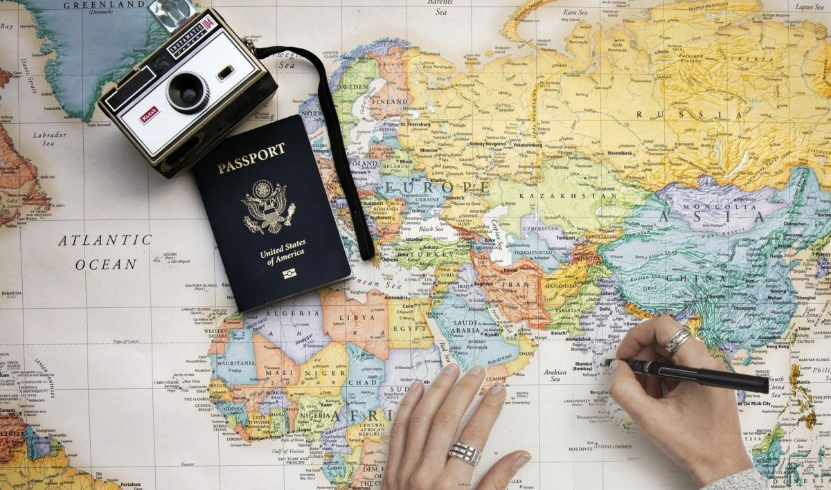 camera, passport, and map: planning a trip