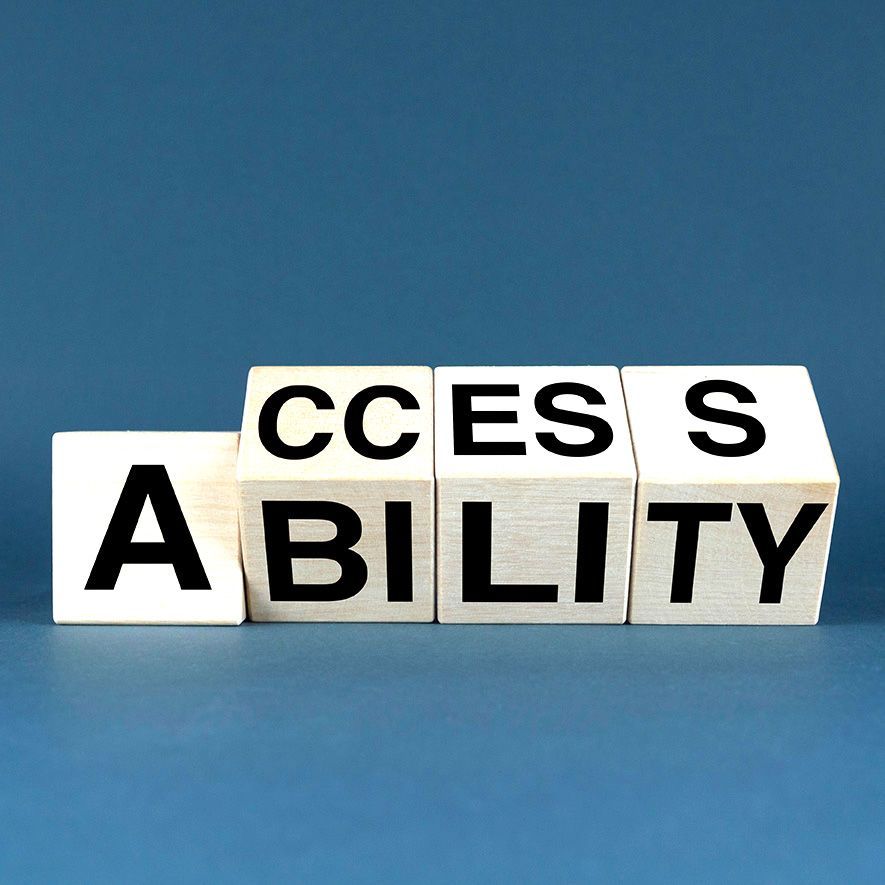 White letter blocks spelling “ACCESSIBILITY” on a blue background.