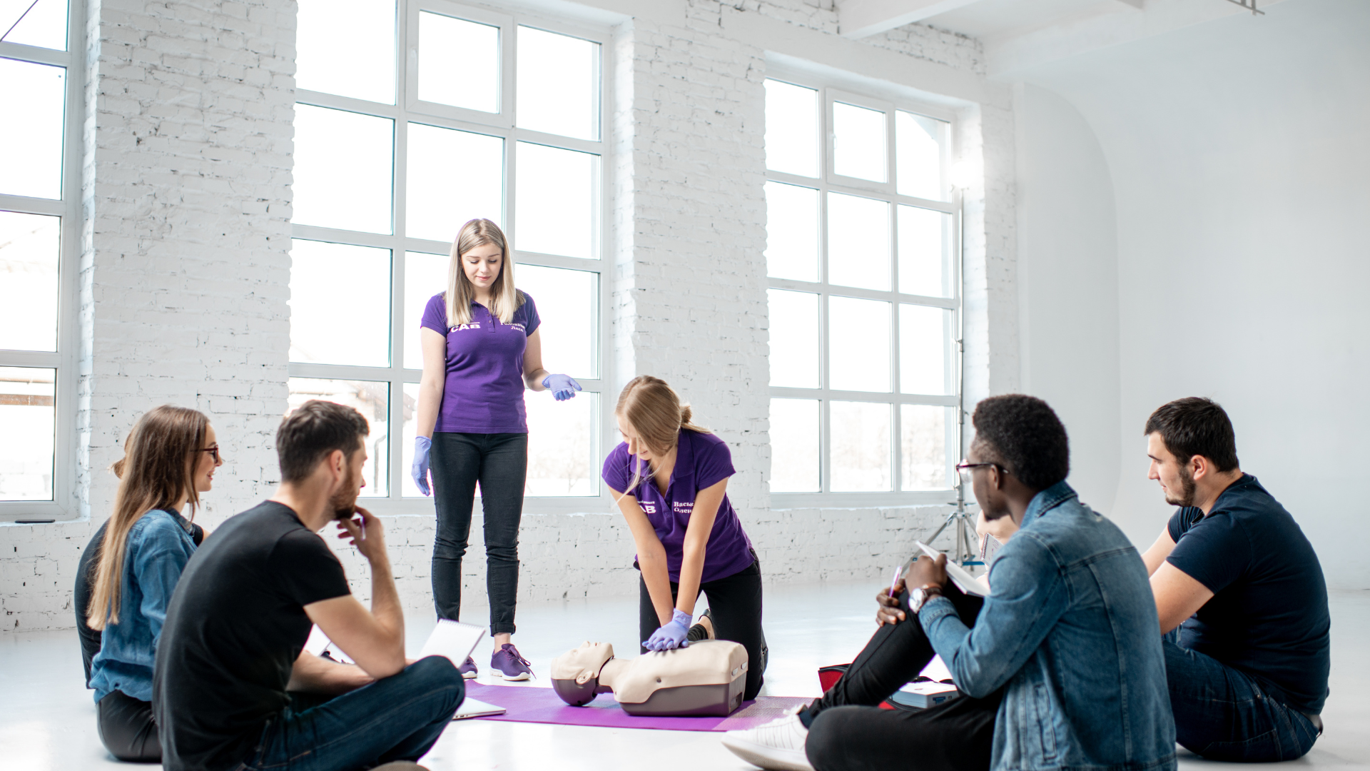 EMT instructor demonstrating equipment during EMT