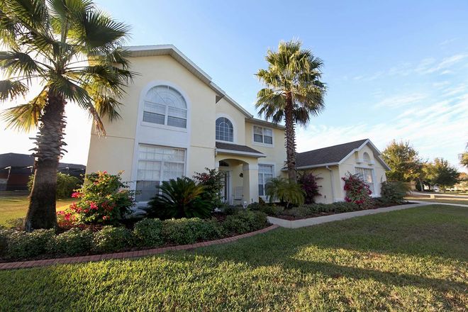 Suburban house with palm trees